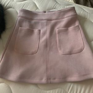 Light pink skirt with front facing pockets